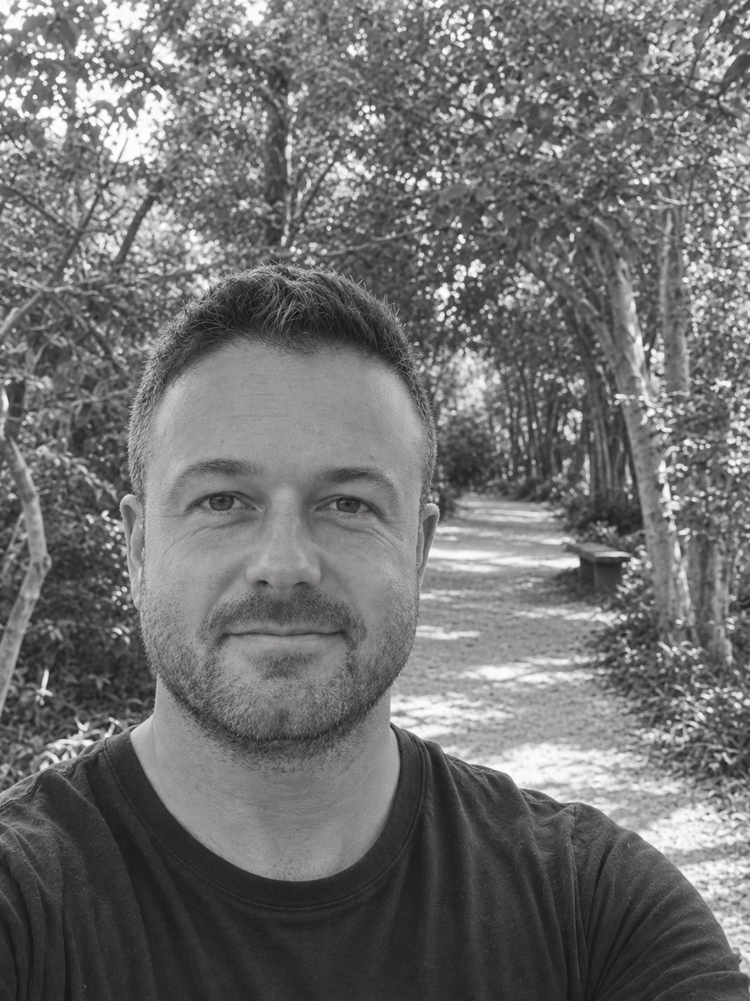 J. Benjamin Young on a tree-lined path
